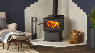 The F2500 is a Medium Hybrid Catalytic wood stove using triple burn combustion technology. It comes with your choice of pedestal or legs and it is available in black or with nickel accents.